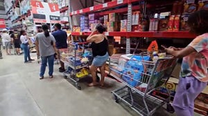 Watch: Cayman Islands residents wait 'hours' for supplies as Hurricane Beryl approaches