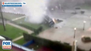 Middle Tennessee State University security camera video captures likely tornado flipping equipment trailer