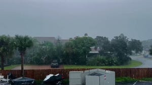 Rain falls on Florida's eastern coast