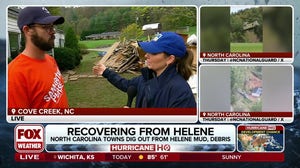 Volunteers help North Carolina towns begin digging out from Helene's mud and debris