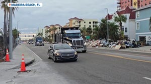 Watch: Police escort trucks filled with debris ahead of Milton's arrival in Florida