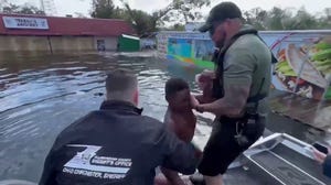 Florida police officers save a 14-year-old boy from Milton floods