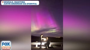 Beautiful proposal happens under dreamy aurora lights