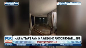 Half a year's worth of rain in a weekend strands New Mexico family on porch as Roswell home turns to river