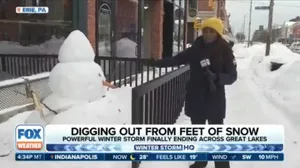 Digging out from feet of snow in the Great Lakes and Northeast