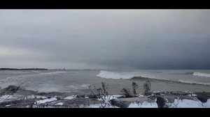 Large rolling seiche on Lake Erie during lake-effect snow event