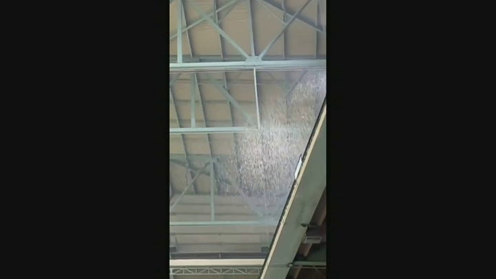 Aerials of Minute Maid Park roof after water leak