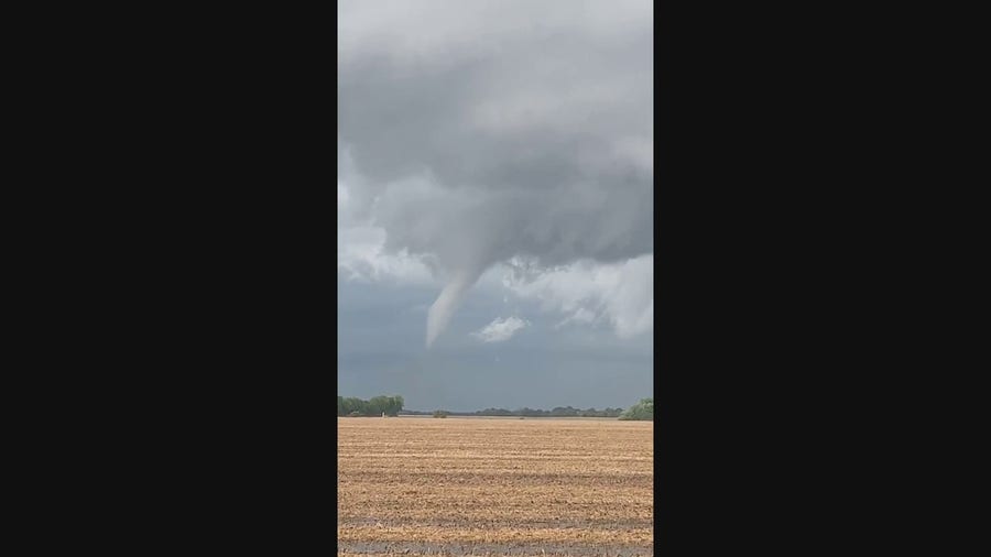 Watch: Funnel cloud spins towards the ground in Illinois