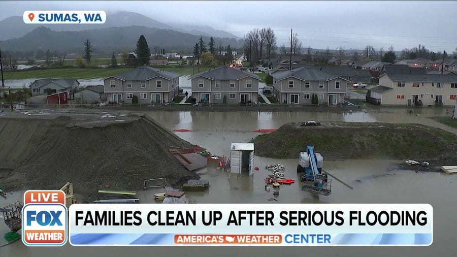 Families begin to clean up after major flooding in Washington