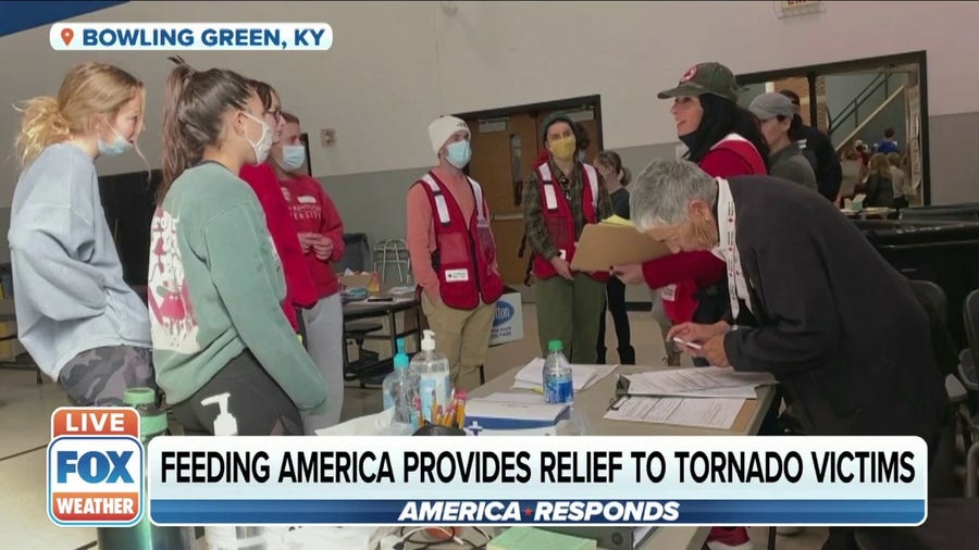 KY branch of Feeding America distributing bags of food to people in need