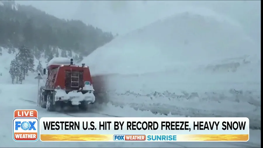 Western US hit by record freeze, heavy snow