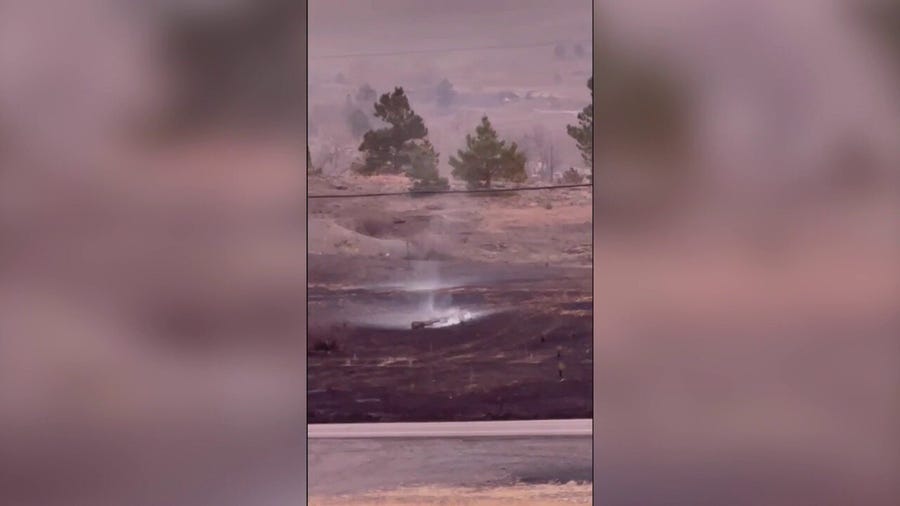 Sunrise reveals scorched earth in Colorado after damaging fires