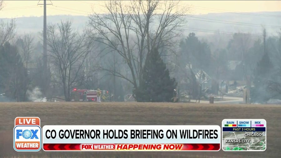 Colorado residents return to destroyed homes after fires