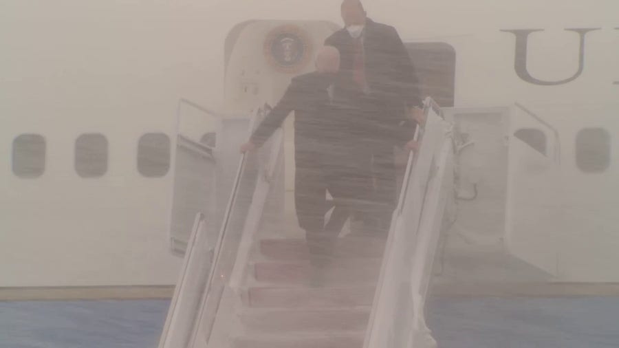 Watch: Pres. Biden exits Air Force One after brief delay upon landing during snowstorm