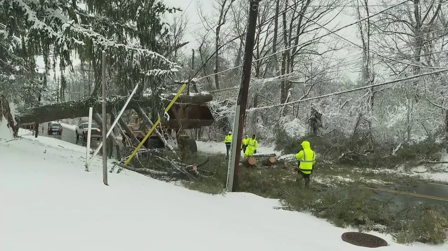 Crews clearing fallen trees in Bethesda, Maryland