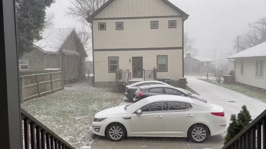 Snow covering cars, roads in Nashville 
