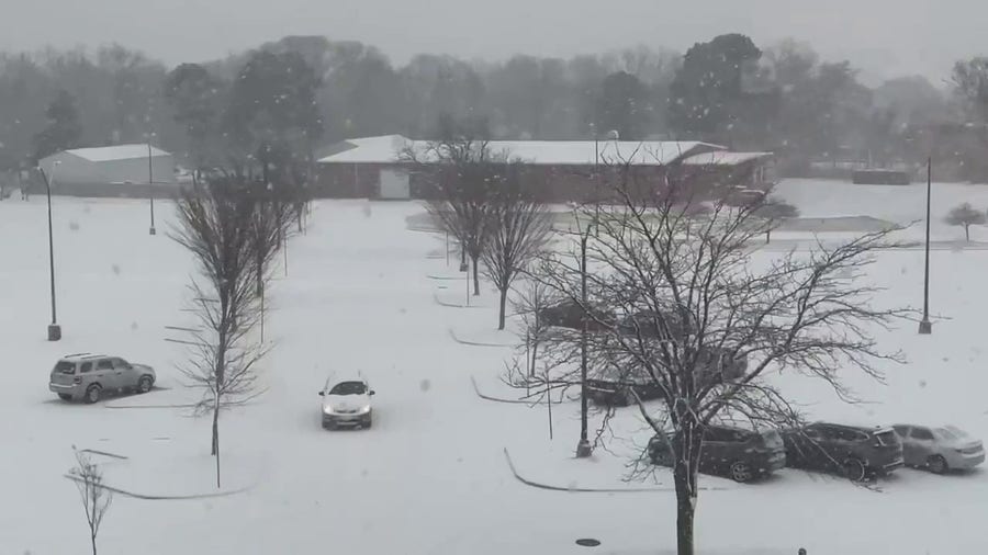 Snow falls on Iowa State University as winter storm bears down