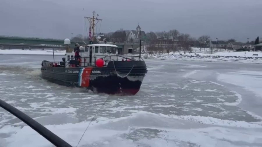 Tugboat breaks ice on Maine river