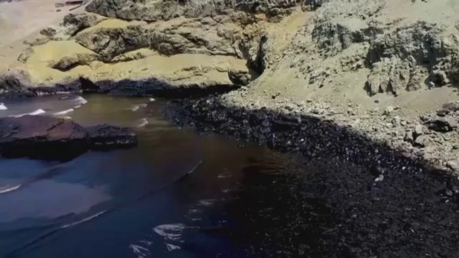 Peru beaches suffer from oil spill blamed on tsunami waves