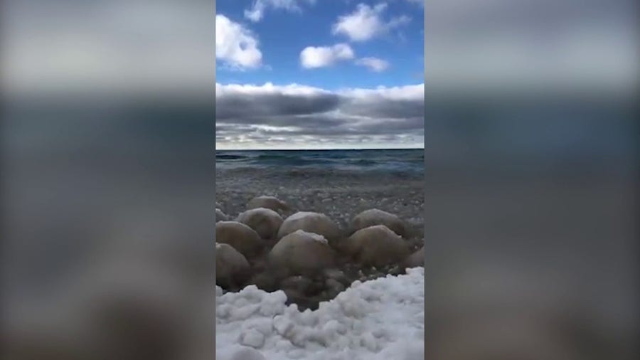 Winter weather brings slush balls, ice volcanoes to Lake Michigan