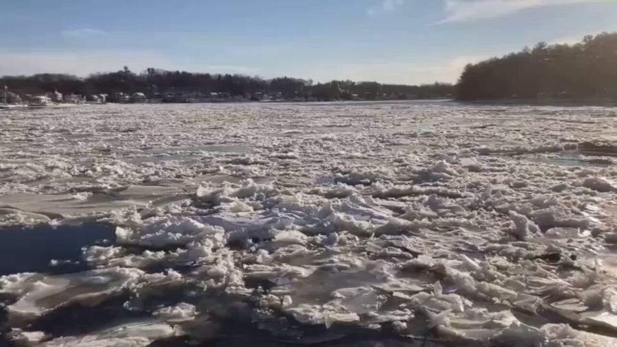 Large chunks of ice float in Massachusetts river during frigid weather