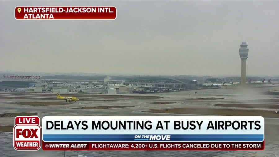 Winter storm causing major delays, cancellations at busy airports