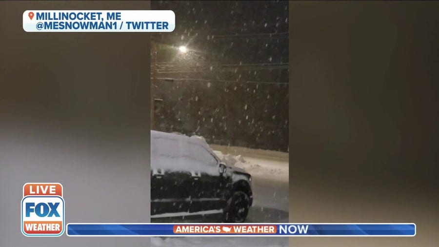 Winter storm covers vehicles with snow in Millinocket, Maine