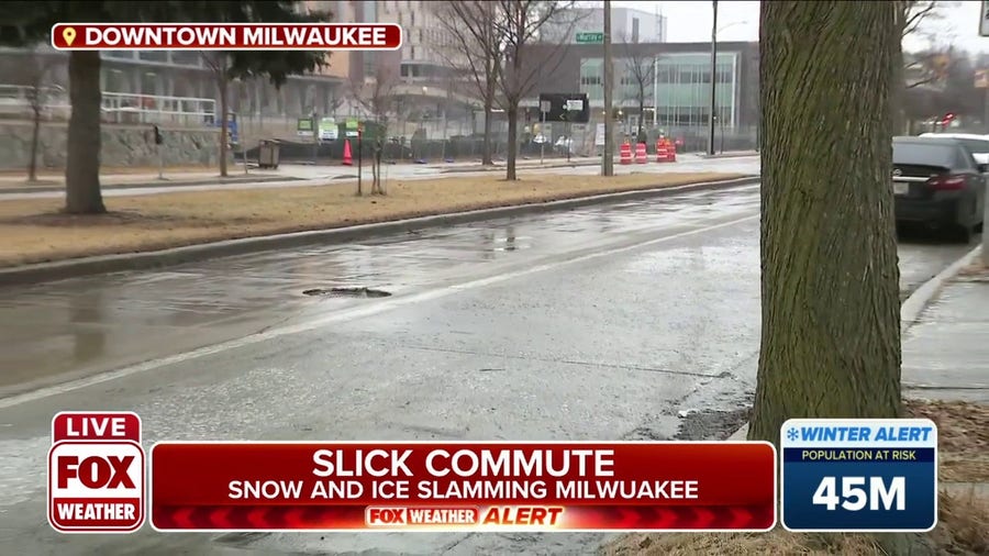 Snow and ice slamming Milwuakee making for a slick morning commute