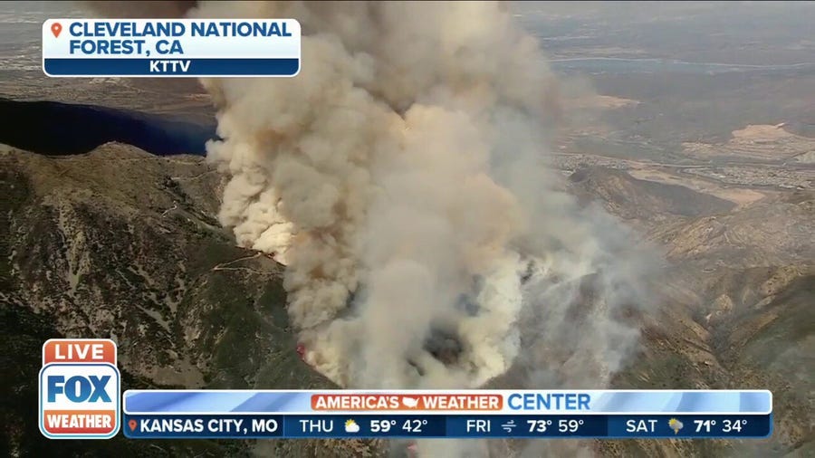 Crews battle wildfire in California national forest