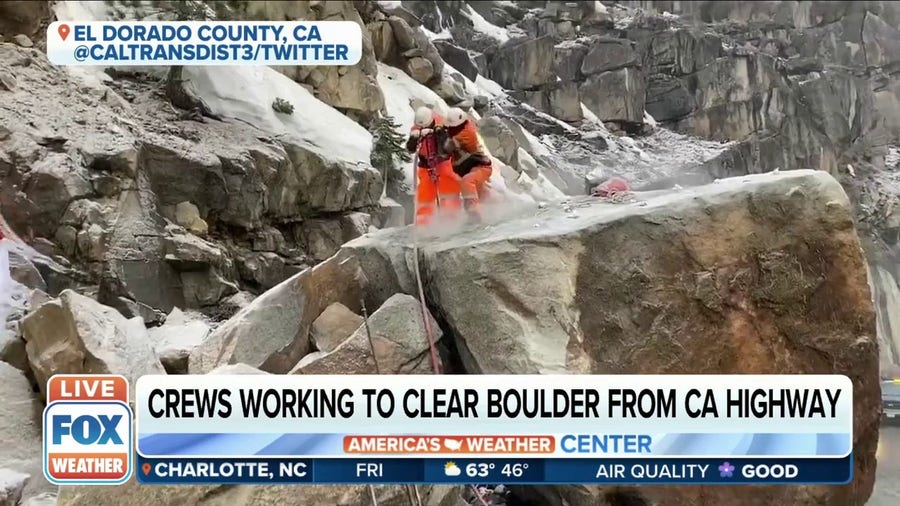 Crews attempt to clear large boulder from California highway