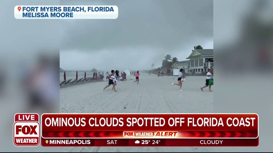 Fort Myers beachgoers run for safety as waterspout moves onshore