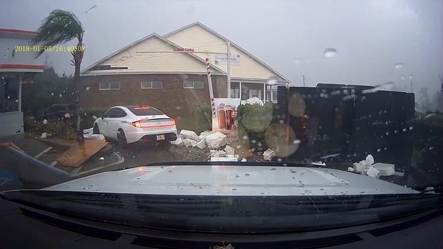 Terrifying video shows tornadic winds damage Ocala restaurant as man screams in car
