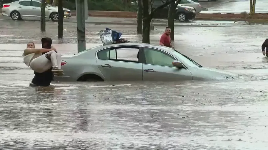 FOX 6 photojournalist saves woman from flooded car in Birmingham, Alabama