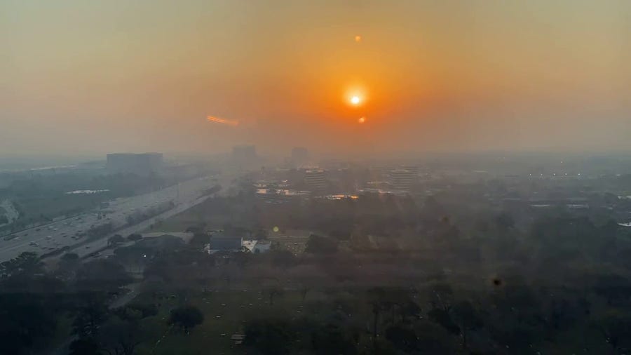 Watch: Sun rising over a smoky Houston sky due to Texas wildfires