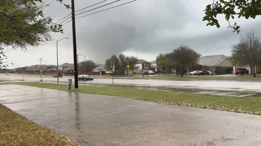 Possible tornado spotted behind homes outside of Austin, Texas