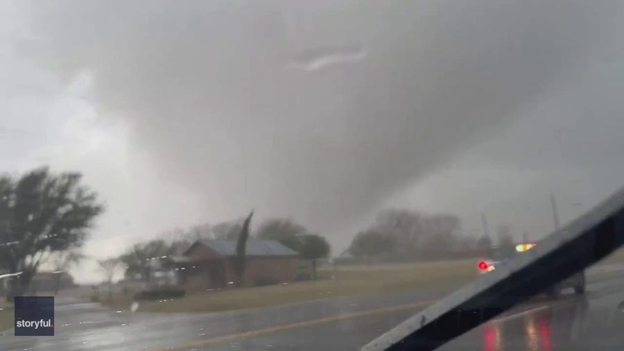 Watch: Massive funnel cloud moves across Texas highway