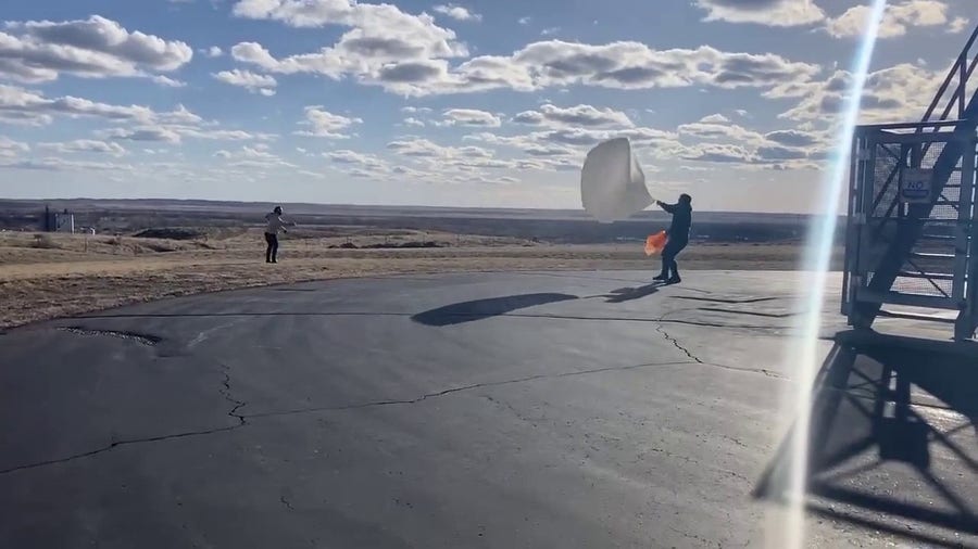 NWS launches weather balloon in strong wind