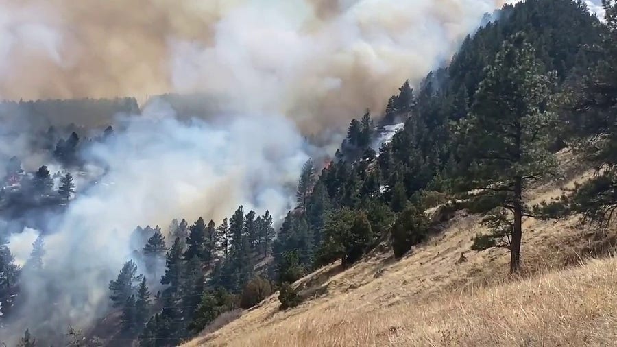 Wildfire burns through brush in Boulder