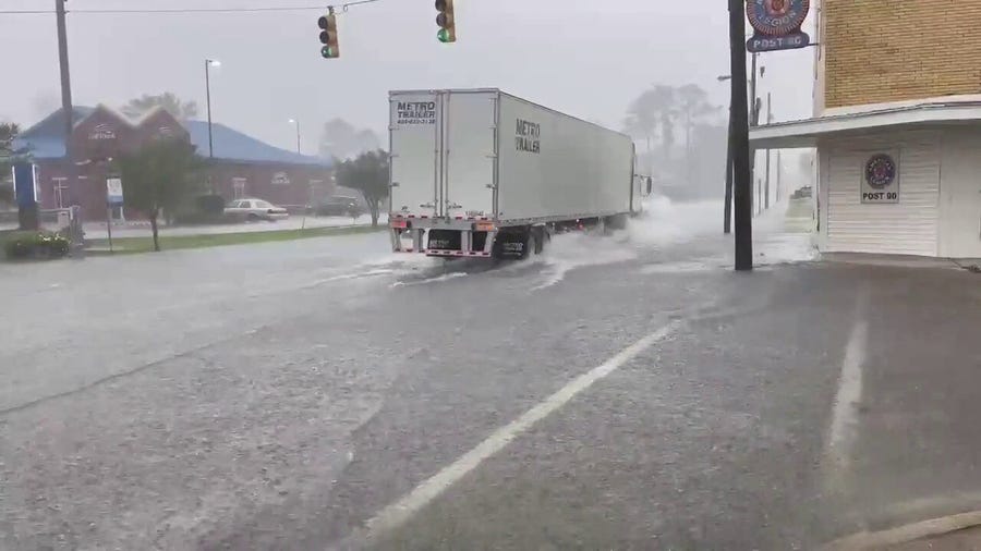 Watch: Heavy rain results in flooded roads for Atmore, AL