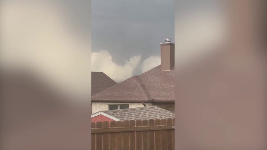 Watch: Man captures tornado touching down in Jarrell, TX from backyard