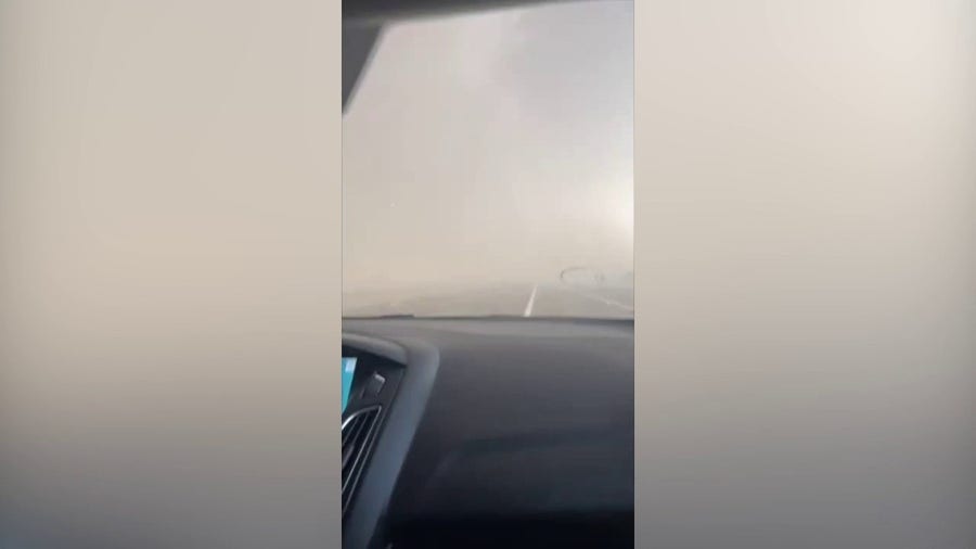 Couple caught in large hail storm along Texas highway