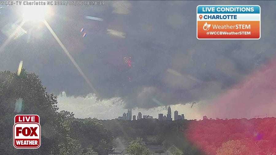 Sun shines through storm clouds in Charlotte, NC
