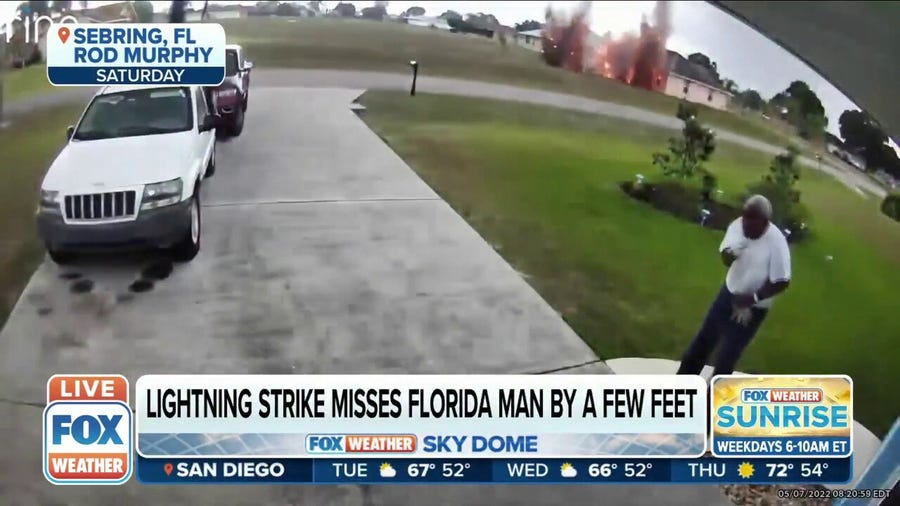 Watch: Lightning strike nearly hits man turning off sprinklers In FL