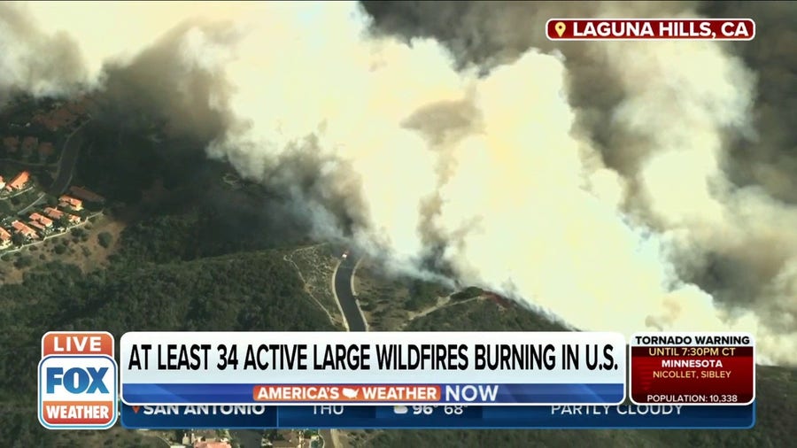 Brush fire grows in Orange County, California