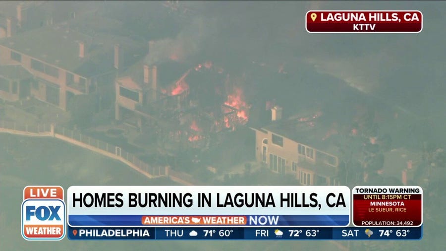 Southern California homes ignite in flames due to brush fire