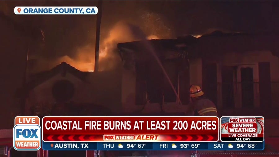 Mansions destroyed by fast-moving brush fire in Orange County, CA