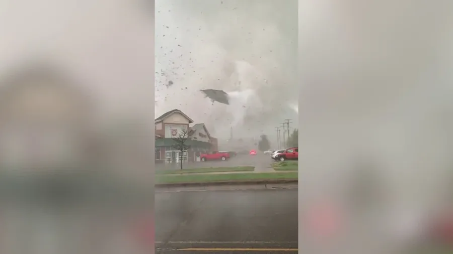 Terrifying video shows tornado tossing debris in northern Michigan