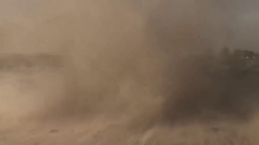 Dust devil spins across road in southwestern Arizona