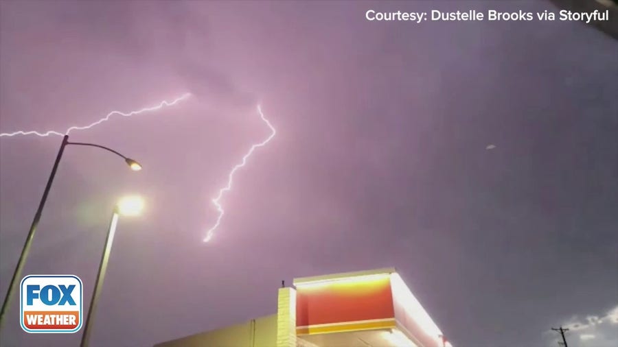 Lightning flashes across night sky over Case Grande, Arizona