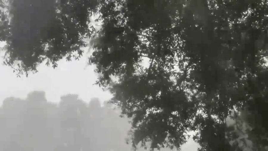 Strong thunderstorm with high winds moves over Orlando, Florida